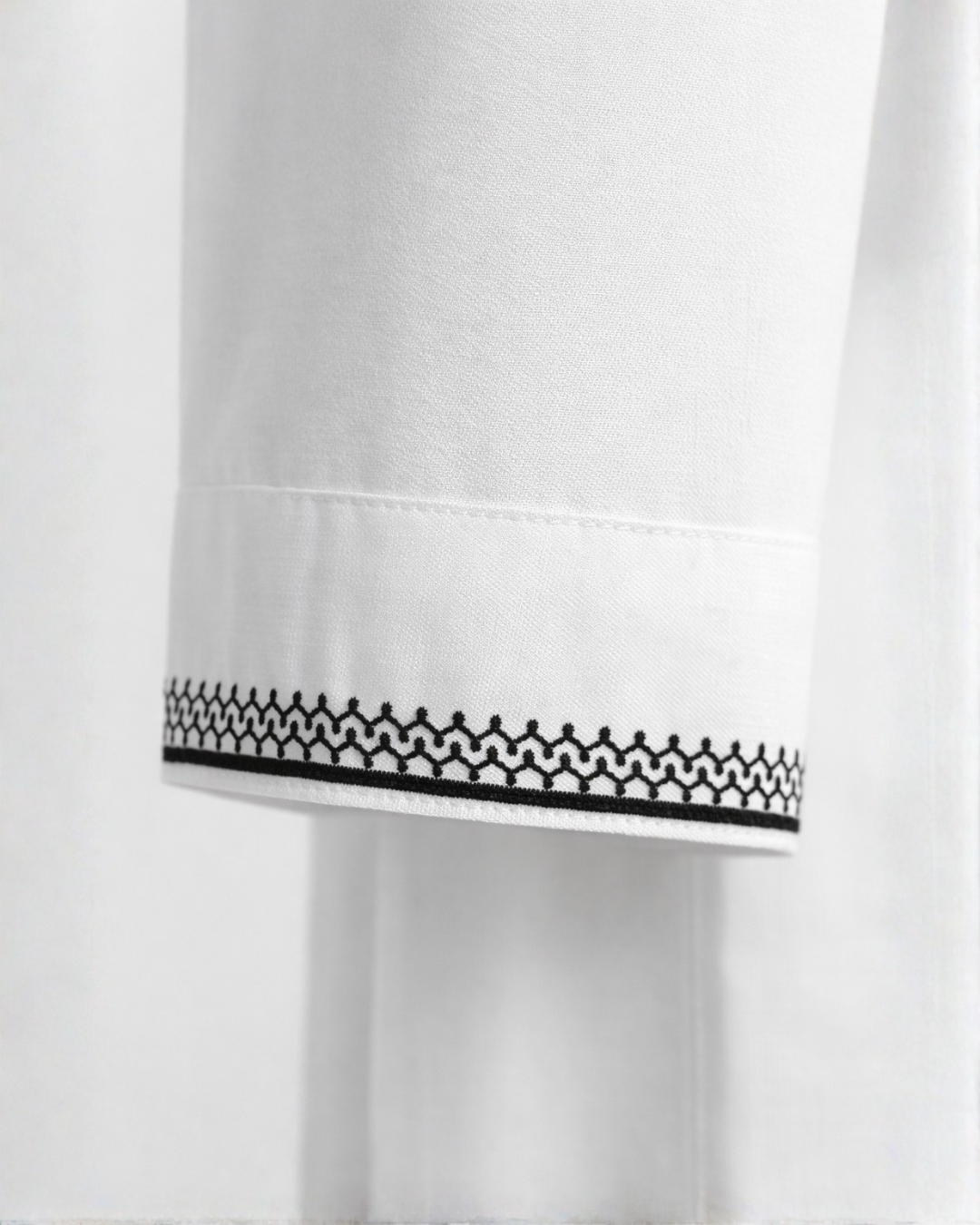 Men’s Classic White Embroidered Thobe with Black Tassel (Teen Size Available)